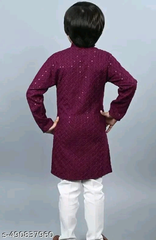 Lucknawi Kurta Pajama Set for Boys
Name: Lucknawi Kurta Pajama Set for Boys
Top Fabric: Rayon
Bottom Fabric: Cotton
Sleeve Length: Long Sleeves
Bottom Type: pyjamas
Top Pattern: Embellished
Net Quantity (N): 1

BOYS KURTA
Sizes: 
0-6 Months (Top Bust Size
